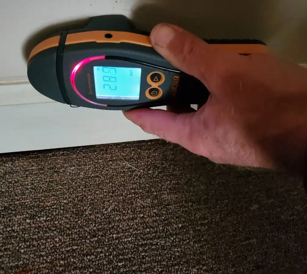 Moisture detection at baseboard during Sewage Cleanup & Sanitation in Buckhead